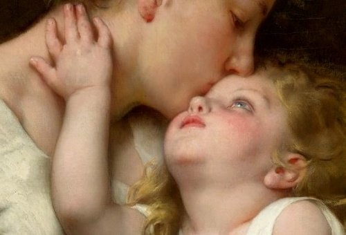 赤ちゃんにキスするママ