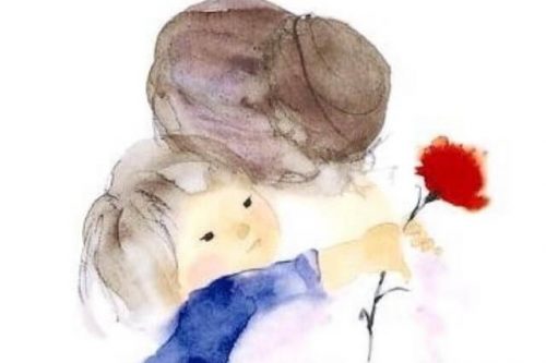 子を抱きしめる